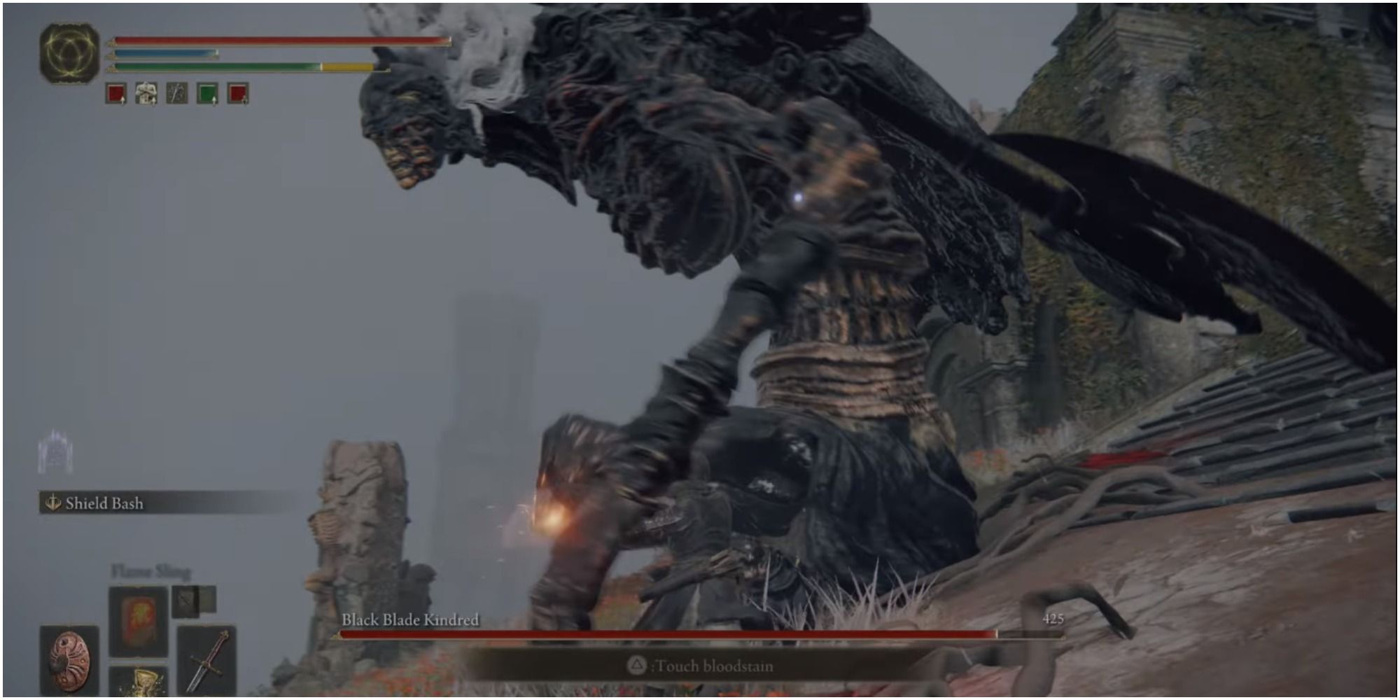 The player using a melee weapon to attack the boss.